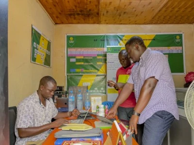 3 Men standing while organising